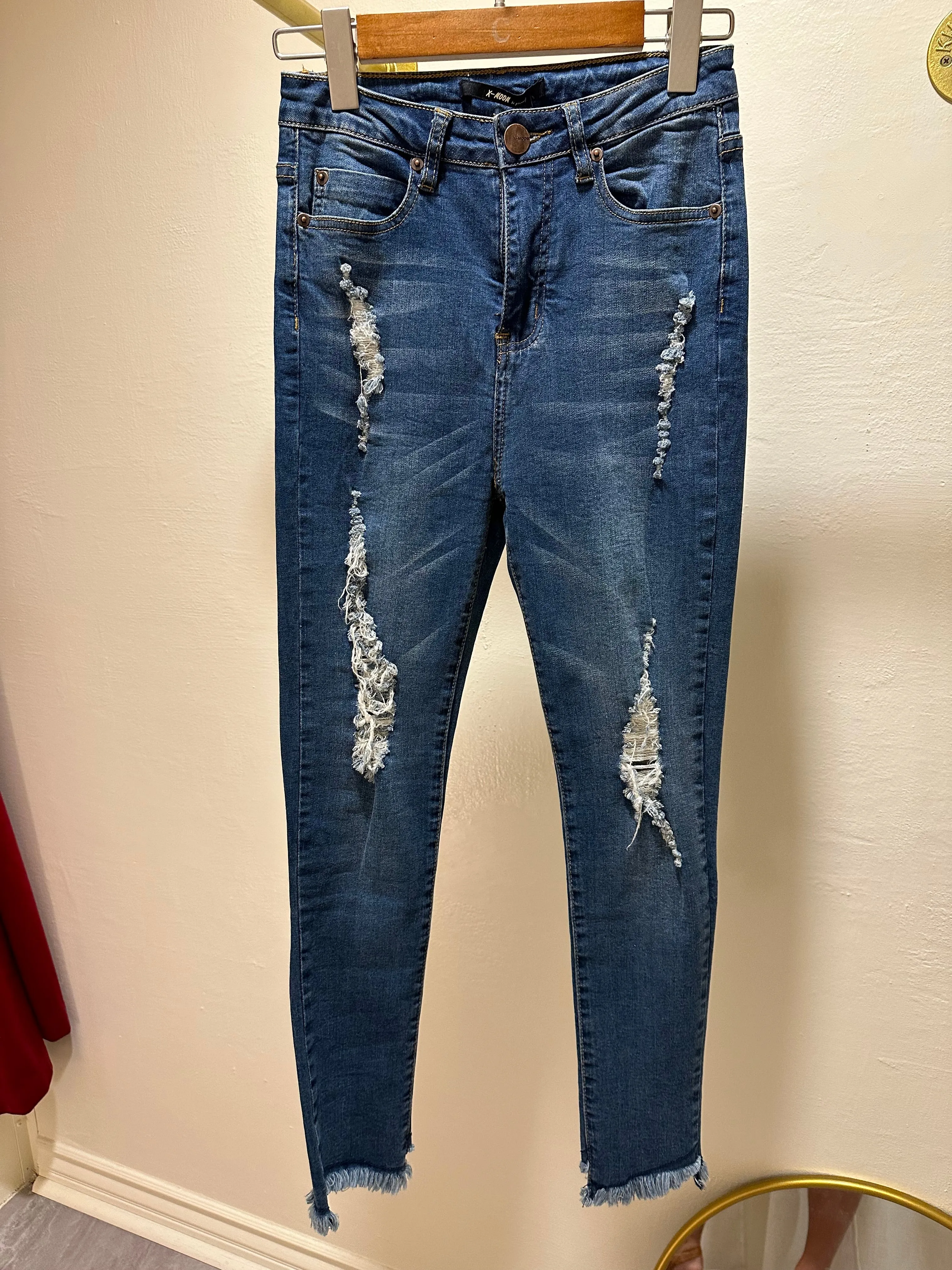 Distressed Slim Jeans